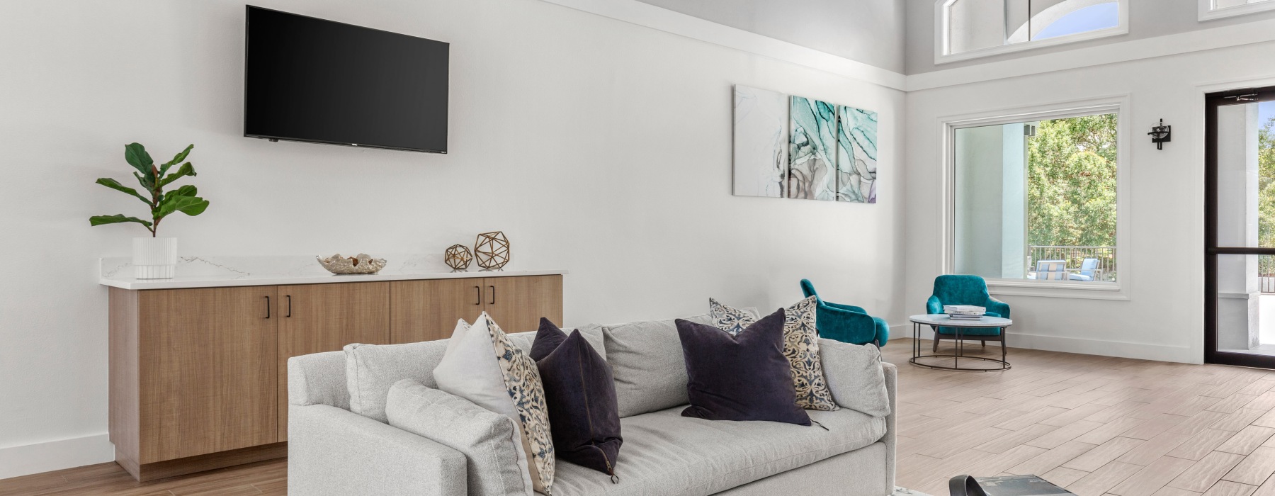 clubhouse lounge with TVs and sitting area